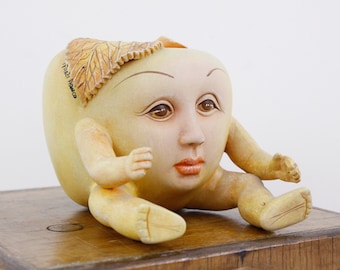 Vintage 'apple boy' surrealist sculpture by Ismael Franco, ceramic surreal art figure