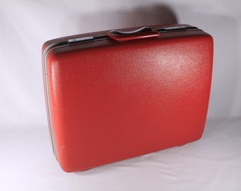 Red Samsonite suitcase, in-flight luggage, cabin bag