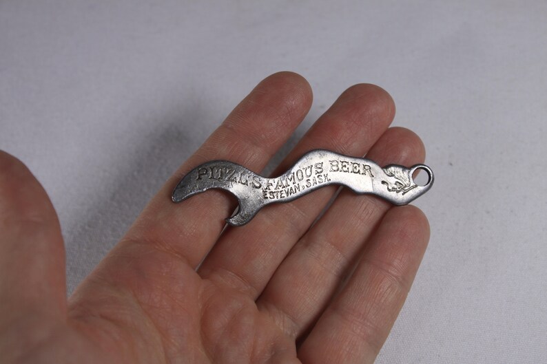 1920s Pitzls Famous Beer antique mermaid beer bottle opener, lady bather Souris Breweries Ltd Estevan Saskatoon image 2