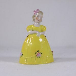 Vintage figurative porcelain hand bell, 4 porcelain girl figurine, young girl in yellow dress hand bell, Flower girl bell image 1