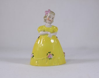 Vintage figurative porcelain hand bell, 4" porcelain girl figurine, young girl in yellow dress hand bell, Flower girl bell