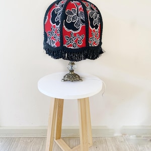 Black and red floral fabric lampshade, vintage style, beaded fringe, handmade in Australia, bedside lampshade, tabletop lampshade.