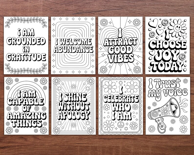 May include: A set of eight black and white inspirational quote cards. Each card features a unique design with phrases like "I AM GROUNDED IN GRATITUDE" and "I CHOOSE JOY TODAY." The cards are decorated with floral and retro-style elements.