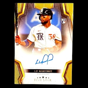 May include: A baseball trading card featuring J.P. Martinez of the Texas Rangers. The card has a gold border and a photo of the player in his uniform, holding a bat. The card is autographed and labeled "Five Star."
