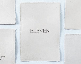 The Hudson Collection - Printed wedding table numbers on handmade paper for a modern and minimalist wedding reception or rehearsal dinner