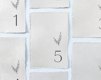 The Theo Collection: Printed wedding table numbers on handmade paper for a modern and minimalist wedding reception or rehearsal dinner