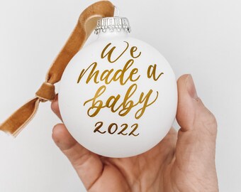 Pregnancy Christmas ornament, pregnancy announcement, we made a baby ornament, we're pregnant ornament, glass ornament, hand written