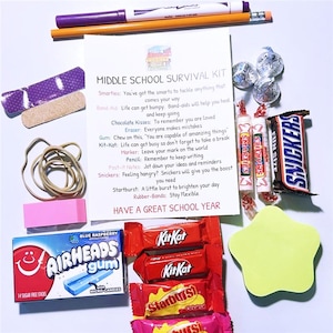 May include: A Middle School Survival Kit with school supplies and candy. Includes Smarties, Band-Aids, Hershey's Kisses, an eraser, gum, Kit-Kat bars, a marker, a pencil, Post-it notes, Snickers, Starbursts, and rubber bands. The kit is designed to help students navigate the school year.