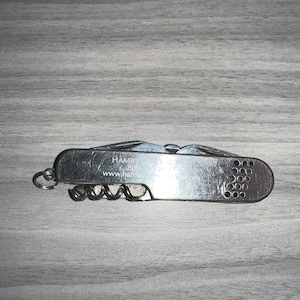 Swiss Army Style Knife - Hambry Dairy Supply Advertisement