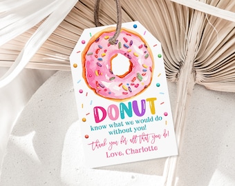 May include: A pink and white donut with colourful sprinkles on a white tag with the text "DONUT know what we would do without you! thank you for all that you do! Love, Charlotte".