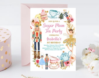 May include: A pink and white invitation card with gold glitter accents. The card features a watercolor illustration of a sugar plum fairy, a nutcracker, and teacups. The text on the card reads "Join us for a Sugar Plum Tea Party Celebrating Isabella's 1st Birthday".