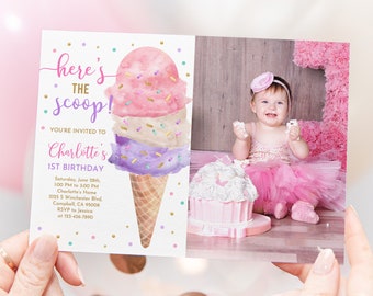 May include: A pink, white, and purple ice cream cone with sprinkles on a white background. The text "here's the scoop!" is written in gold lettering. The text "You're invited to Charlotte's 1st Birthday" is written in gold lettering. The text "Saturday, June 28th, 1:00 PM to 3:00 PM, Charlotte's Home, 2125 S Winchester Blvd, Campbell, CA 95008, RSVP to Jessica at 123-456-7890" is written in black lettering. A photo of a baby girl in a pink tutu and a pink flower headband is on the right side of the card.