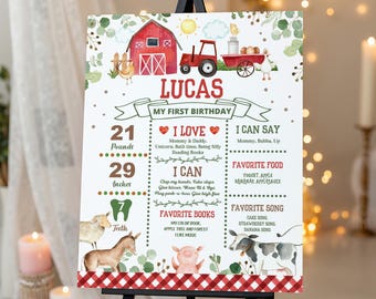 Peut inclure: Une affiche d'anniversaire blanche avec une grange rouge, un tracteur et des animaux de ferme. Le texte indique Lucas, My First Birthday, 21 Pounds, 29 Inches, 7 Teeth, I Love, I Can, I Can Say, Favorite Food, Favorite Books et Favorite Song.