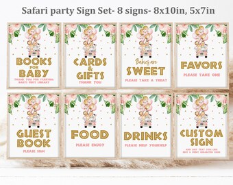 May include: Set of eight printable safari-themed baby shower signs. The signs feature a pink and gold color scheme with jungle animals and balloons. The signs include titles such as "Books for Baby", "Cards & Gifts", "Babies are Sweet", "Favors", "Guest Book", "Food", "Drinks", and "Custom Sign".