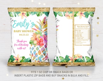 May include: A white chip bag with a tropical theme. The bag features a pineapple with a rainbow design, pink and red hibiscus flowers, and green leaves. The text on the bag reads "Emily's Baby Shower 10.23.22 Thank you for celebrating with us!" and "Fits 1 oz chip or snack bags or insert plastic zip bags and buy snacks in bulk and fill."