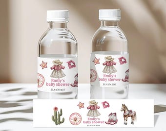 May include: Two clear water bottles with pink and white labels. The labels feature a cartoon cowgirl, a cactus, a wagon wheel, and the text "Emily's baby shower" with a date.