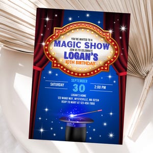 May include: A blue invitation for a magic show, with the text "MAGIC SHOW" and "LOGAN'S 10TH BIRTHDAY". The design includes a stage curtain, a magician's hat, and a wand. The date is September 30th at 2:00 PM.