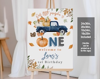 May include: A blue truck with a pumpkin load, surrounded by autumn leaves, reads "Our little pumpkin is ONE welcome to Lucas's 1st Birthday". The sign is available in sizes 24x36 inches, 20x30 inches, 18x24 inches, and 16x20 inches. The 16x20 inch size can be printed as an 8x10 inch sign.