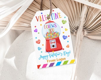 Może przedstawiać: Etykieta na prezent walentynkowy z kolorową ilustracją automatu do gum do żucia. Tekst brzmi "I Chews You" i "Happy Valentine's Day! From: Logan".