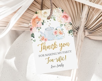 May include: A white thank you tag with gold glitter text that says "Thank you for making my party Tea-riffic! Love, Emily". The tag is decorated with a watercolor illustration of a teapot and teacups with pink and white flowers.