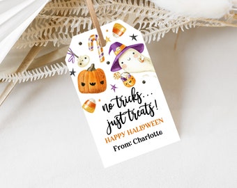 May include: White gift tag with a cute cartoon ghost wearing a purple witch hat and holding a candy bucket. The tag has a pumpkin, candy corn, and stars. The text reads "no tricks... just treats! Happy Halloween From: Charlotte"