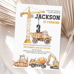 May include: A construction-themed birthday invitation featuring a yellow crane lifting a dump truck with the number 3. The invitation includes the text "JACKSON IS TURNING" and event details. Additional construction vehicles are at the bottom.