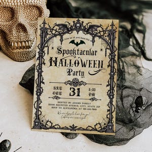 May include: A rectangular Halloween party invitation printed on aged parchment paper. The design features a black gothic archway frame with bat and skull motifs, spiderwebs, and the text: Join us if you dare for a Spooktacular HALLOWEEN Party.