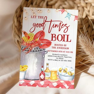 May include: A watercolour invitation card with the words "Let the good times BOIL". The card depicts a crawfish boil with a pot of crawfish, corn, and other food items. The event is hosted by The Anderson, with date and time.