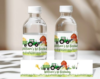 May include: Two clear water bottles with labels featuring a green tractor, red barn, and farm animals. The labels read "William's 1st Birthday" in green text. The design includes a green field and a hay bale.