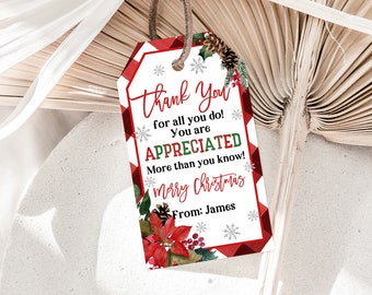 May include: Red and green Christmas gift tag with a white background. The tag has a plaid pattern and a poinsettia flower. The text on the tag reads "Thank You for all you do! You are APPRECIATED More than you know! Merry Christmas From: James".