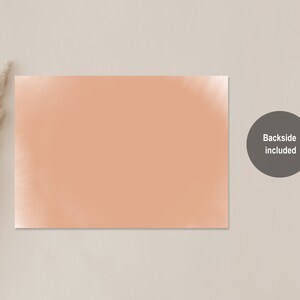 May include: A peach-colored card with a smooth, slightly textured surface. The card is blank and ready for writing. Backside included.