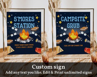Puede incluir: Dos carteles imprimibles con una fogata y texto. El primer cartel dice "S'mores Station" y el segundo cartel dice "Campsite Grub".