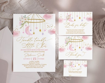 May include: Twinkle Twinkle Little Star baby shower invitation with pink and gold accents. The invitation features a whimsical mobile with stars and moons. The text reads "Twinkle Twinkle Little Star" and includes details for the shower, including the date, time, and location.