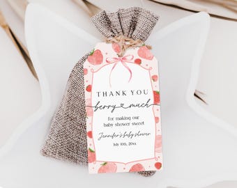 May include: Pink and white thank you tag with a strawberry design. The tag says "Thank you berry much for making our baby shower sweet Jennifer's baby shower July 10th, 20xx".