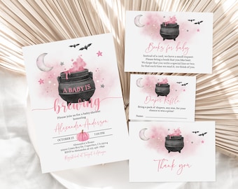 May include: A pink and black baby shower invitation with a cauldron and bats. The text reads "A baby is brewing".