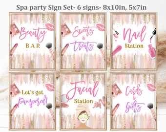 May include: Six printable signs for a spa party. The signs are pink and gold with brushstrokes and glitter. The signs say "Beauty Bar", "Sweets & Treats", "Nail Station", "Let's Get Pampered", "Facial Station", and "Cards & Gifts".