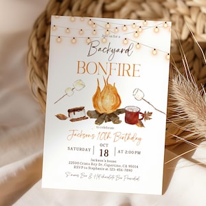 May include: A party invitation with a backyard bonfire theme. The invitation features watercolor illustrations of a bonfire, marshmallows, s'mores, and a mug of hot chocolate. Text includes "Backyard Bonfire" and "Jackson's 10th Birthday."