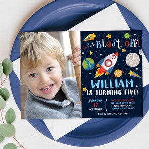 May include: A blue and black space-themed birthday party invitation with a rocket ship, planets, and stars. The invitation says "3-2-1-Blast Off! William is turning five!" with the date and time of the party.
