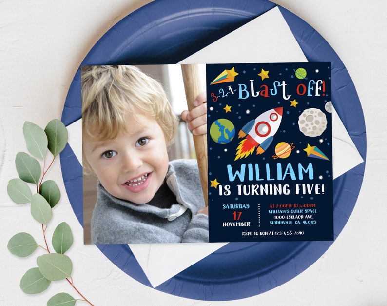 May include: A blue and black space-themed birthday party invitation with a rocket ship, planets, and stars. The invitation says "3-2-1-Blast Off! William is turning five!" with the date and time of the party.