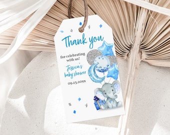 Puede incluir: Etiqueta de agradecimiento azul y plateada con un elefante de dibujos animados sosteniendo globos. El texto dice "¡Gracias por celebrar con nosotros! Baby shower de Jessica 09.23.20XX"