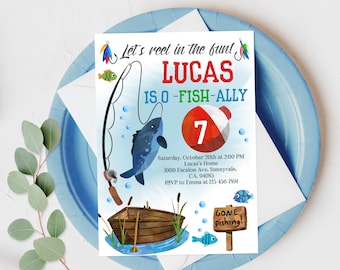 May include: A blue and white birthday invitation for a boy's 7th birthday party with a fishing theme. The invitation features a cartoon fish, a fishing rod, a boat, and a bobber with the number 7 on it. The text on the invitation reads "Let's reel in the fun! Lucas is o-fish-ally 7. Saturday, October 20th at 2:00 PM Lucas's Home 1000 Escalon Ave, Sunnyvale, CA. 94085 RSVP to Emma at 123-456-7891 Gone Fishing!"