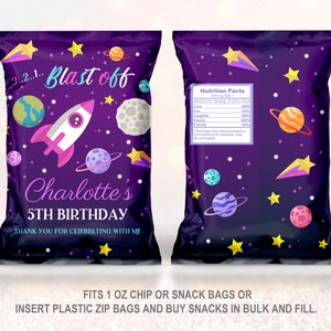May include: Purple and pink space-themed chip bag with a rocket, planets, and stars. The bag says "3...2..1.. Blast off Charlotte's 5th Birthday Thank you for celebrating with me".