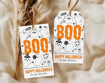 May include: Two white Halloween gift tags with orange "BOO" text and cartoon ghosts. The tags read "Here's a little treat for you! HAPPY HALLOWEEN From: Amelia". Each tag has a brown ribbon for hanging.