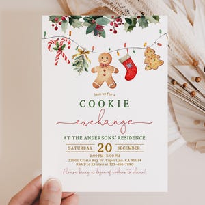 May include: A white invitation card for a cookie exchange, featuring watercolor illustrations of Christmas cookies and decorations. The text reads "Cookie Exchange" with event details, including date, time, and location.