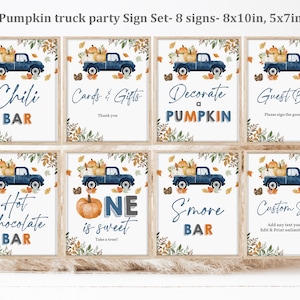 May include: Set of eight printable signs featuring a blue pickup truck with pumpkins and fall foliage. The signs include text such as "Chili Bar", "Cards & Gifts", "Decorate a Pumpkin", "Guest Book", "Hot Chocolate Bar", "One is Sweet", "S'more Bar", and "Custom Sign".