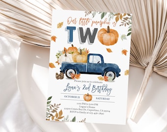 May include: A blue truck with a bed full of pumpkins, leaves, and fall foliage. The truck is driving on a white background with the text "Our little pumpkin is TWO" and "Logan's 2nd Birthday" in a blue and gray font. The invitation also includes the date, time, and location of the party.
