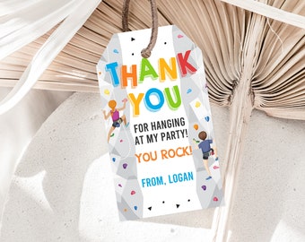 May include: Thank you tag with a rock climbing theme. It says "Thank You for hanging at my party! You Rock! From, Logan".
