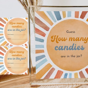 May include: A printable game card with a colorful sunburst design. The card says "Guess How many candies are in the jar?" and has a space for a name and guess.
