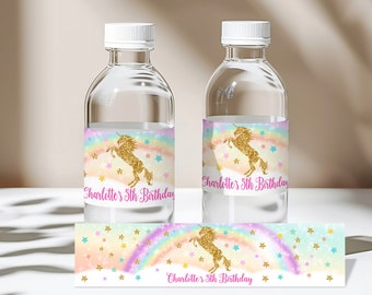 May include: Water bottle labels with a rainbow, stars, and a gold glitter unicorn. The labels say "Charlotte's 5th Birthday".
