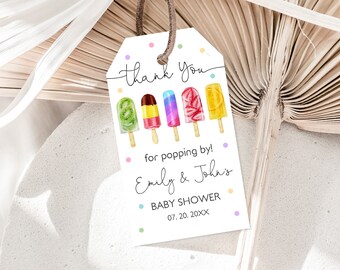 May include: Thank you for popping by! Emily & John's Baby Shower 07.20.20XX. A white tag with colorful polka dots and a handwritten message. The tag features a colorful illustration of six popsicles.